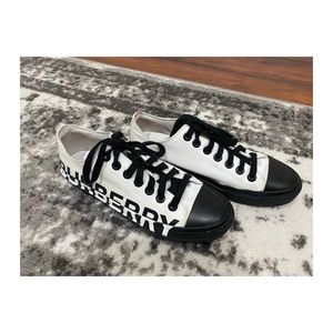 BURBERRY
Black & White Larkhall M Logo Sneakers